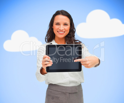 Businesswoman pointing to her digital tablet