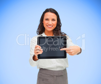 Businesswoman pointing on her digital tablet Businesswoman pointing on her digital tablet