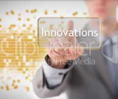 Businessman pointing to the word innovations