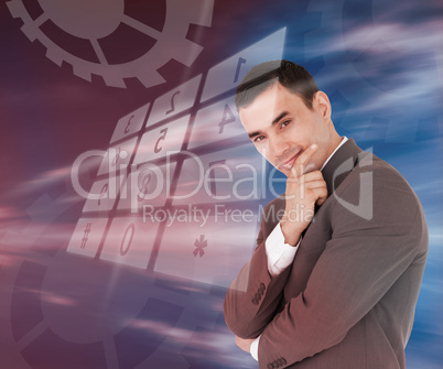 Businessman standing smiling with holographic number pad