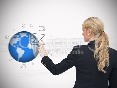 Woman touching at a message symbol against white background