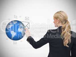 Woman touching at a message symbol against white background