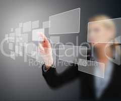 Businesswoman selecting square from interface