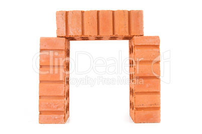 Three stacked red bricks