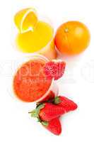 Orange and strawberry juice standing