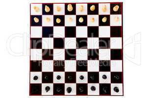 Black and white chess pieces standing