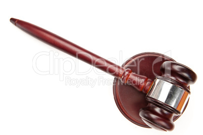Brown gavel lying Brown gavel lying