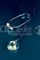 Black stethoscope in the dark