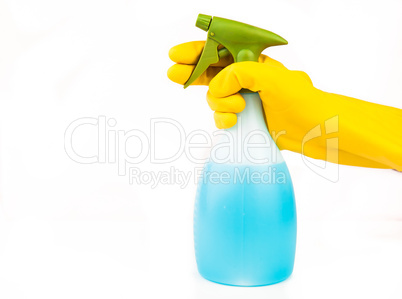 Hand holding spray bottle