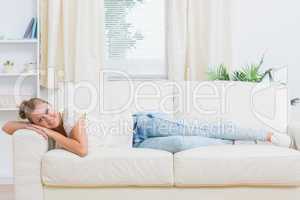 Woman lying on the couch