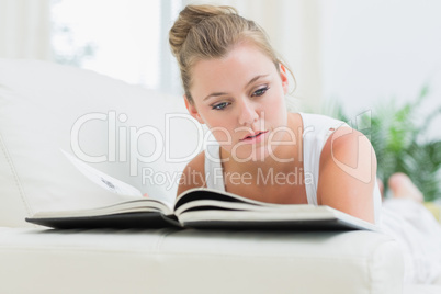 Woman reading the magazine