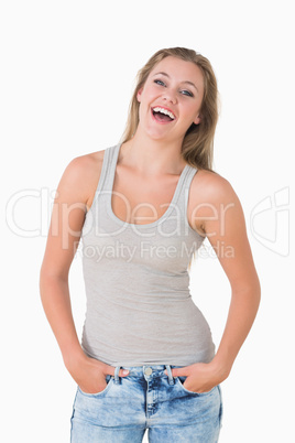 Woman laughing while looking casual