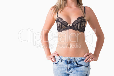 Blonde woman holding her waist