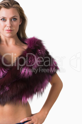 Woman wearing a pink fur stole