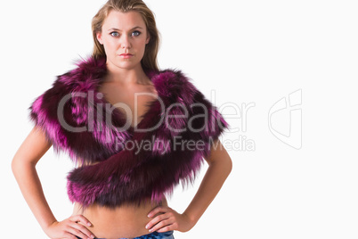 Topless woman in fur stole