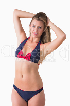 Blonde shaking her hair while wearing bikini