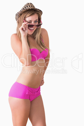 Woman wearing underwear and winking