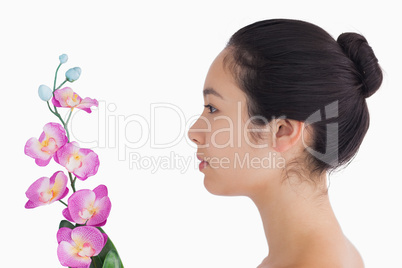 Woman looking at orchids