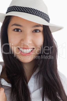 Smiling woman wearing a hat