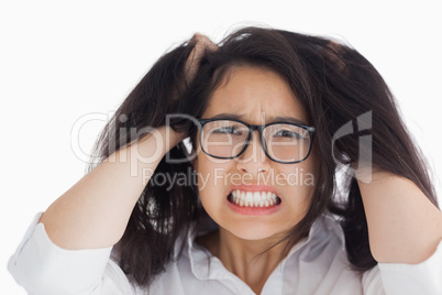 Worried woman putting her hand on the head