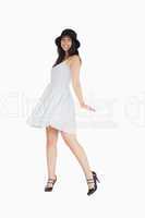 Woman twirling in her pretty dress
