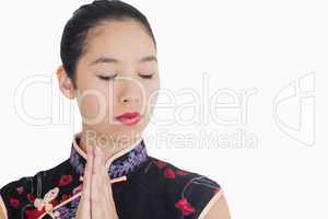 Geisha style woman closing her eyes