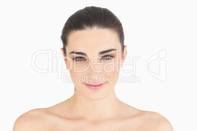 Natural woman smiling at camera