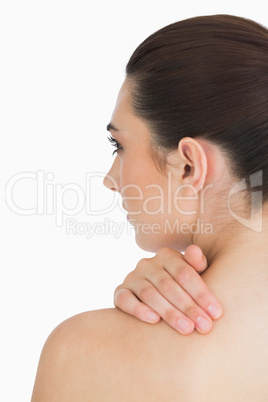 Woman touching her skin