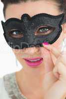 Woman wearing a black mask
