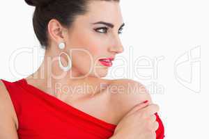 Woman in red dress looking away