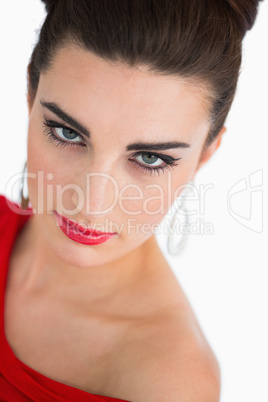 Woman in red dress looking at camera