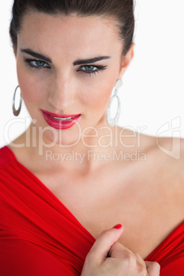 Woman touching her red dress