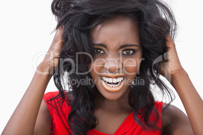 Woman tousling her curly hair