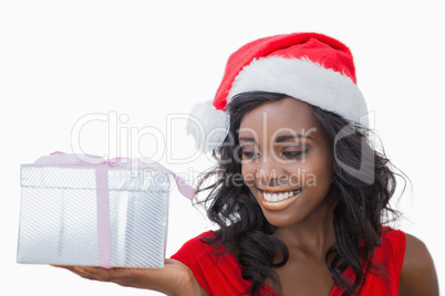 Woman standing looking at a gift