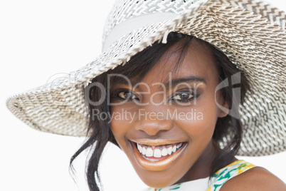 Woman wearing summer hat smiling