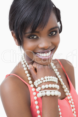 Woman wearing pearl bracelet and necklace