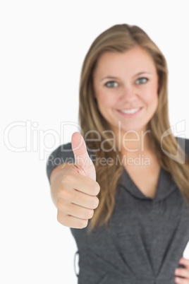 Woman giving thumbs up