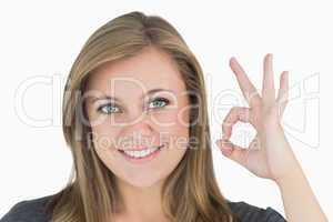 Woman making hand sign