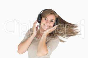 Woman dancing with headphones