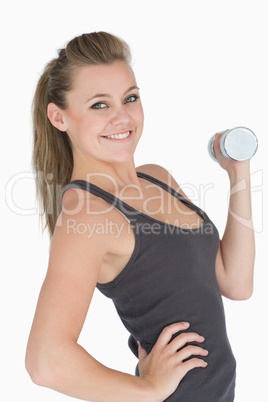 Woman lifting dumbbell