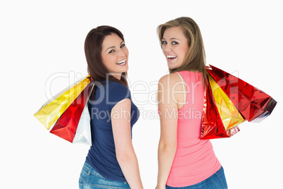 Two happy women with shopping bag