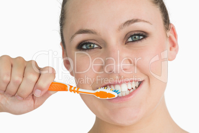 Woman washing her teeth