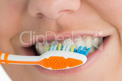 Close up of mouth and toothbrush