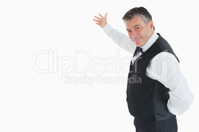 Waiter showing something Waiter showing something
