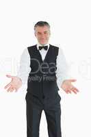 Waiter with open arms