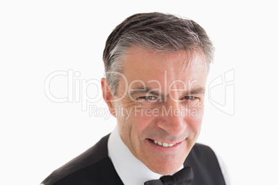 Smiling waiter looking at camera