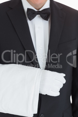 Waiter holding a towel