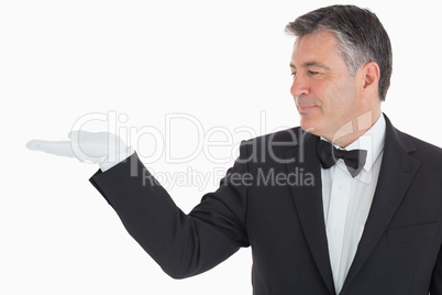 Waiter showing us his opened hand
