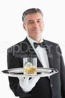 Man serving whiskey on toy