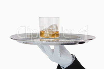 Close view of the tray with whiskey